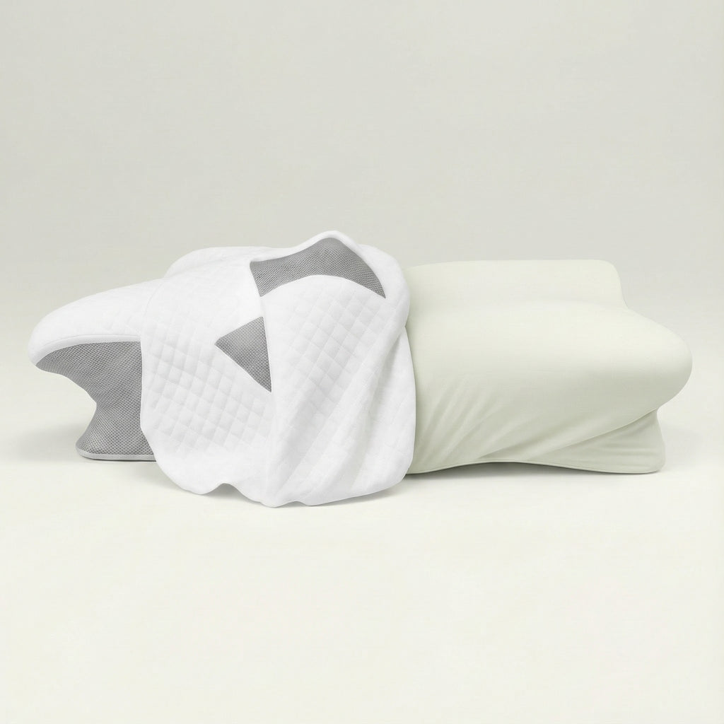 White and gray pillow on a light gray background