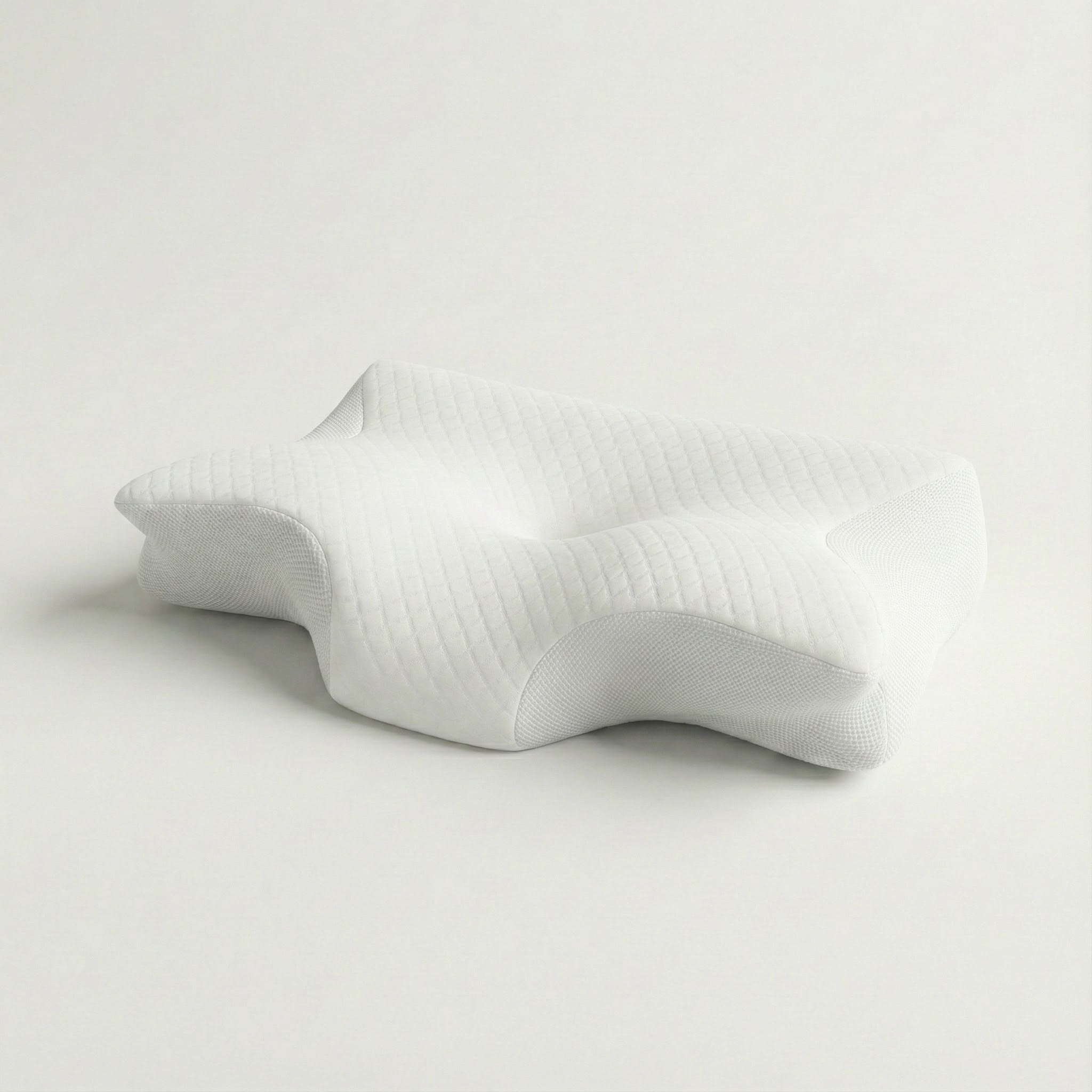 White pillow on a light gray background