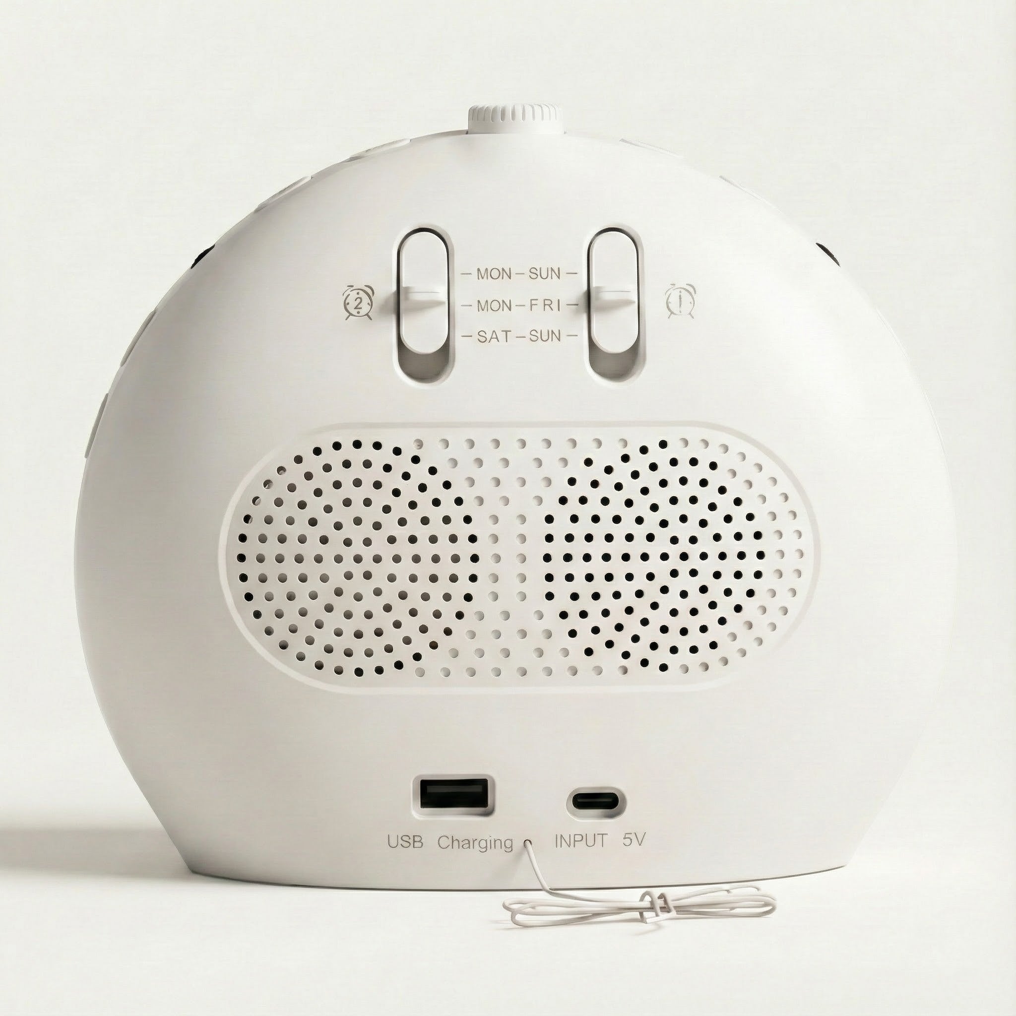 White electronic device with control buttons and ports on a light gray background