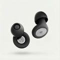 Black wireless earbuds on a light gray background